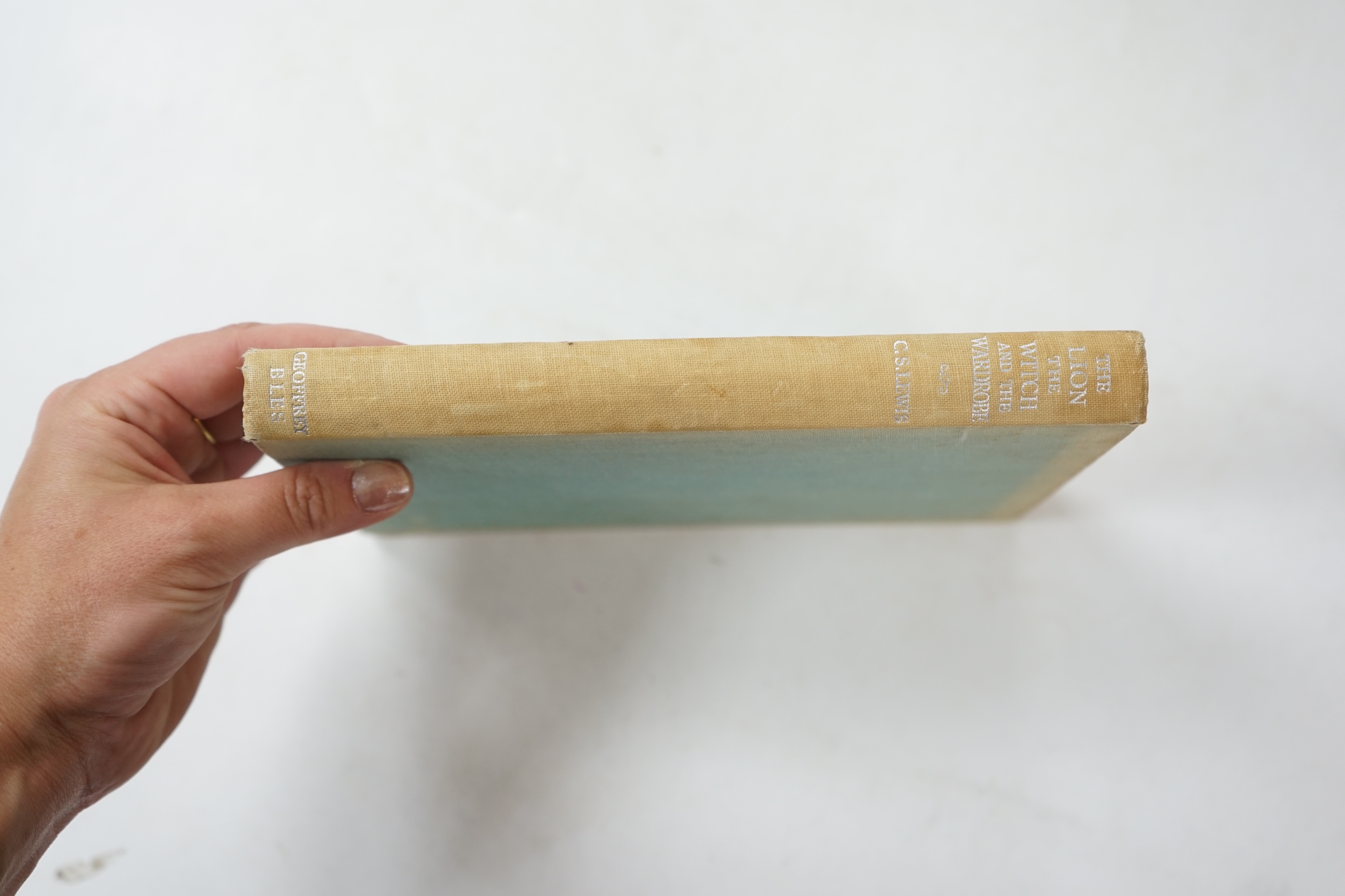 Lewis, C.S. - The Lion, the Witch and the Wardrobe. A Story for Children. 1st edition. coloured frontis. & num. text illus. (by Pauline Baynes, 6 full page); publisher's cloth, silver lettered on spine. Geoffrey Bles, 19